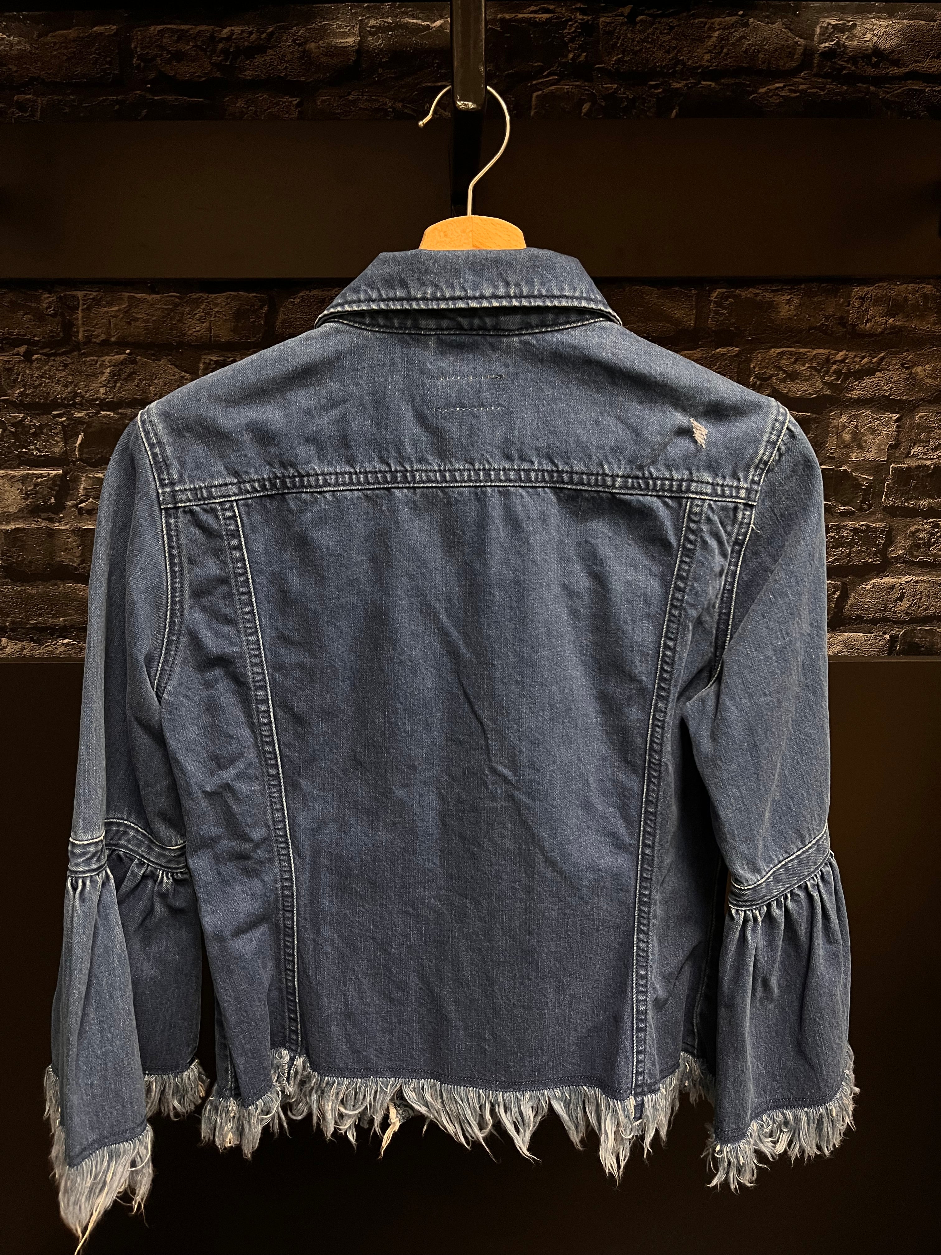 Geacă denim - Kings of Indigo realizata din 100% bumbac organic cu maneci evazate și franjuri